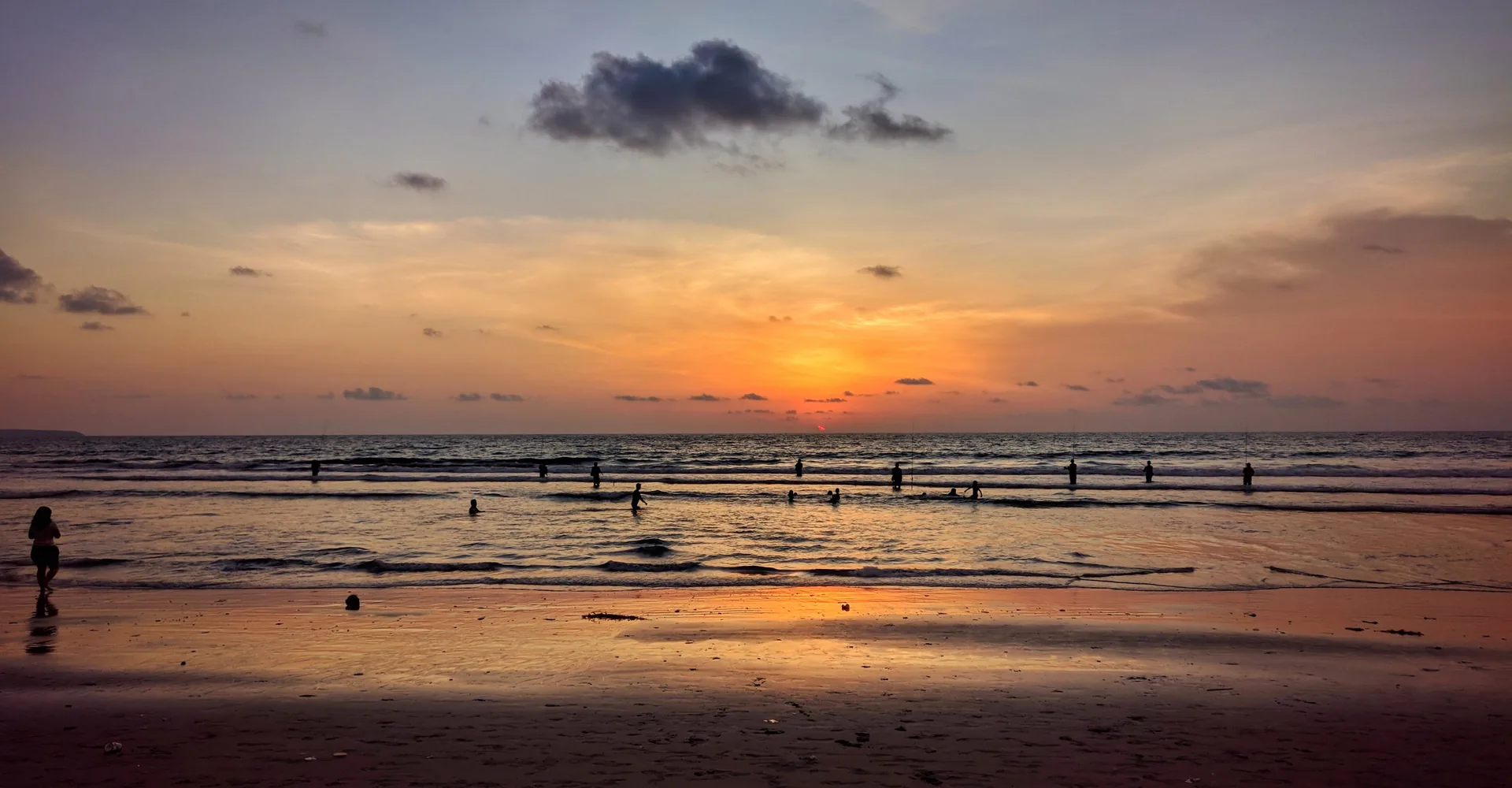 Boats on tidal flats at sunset