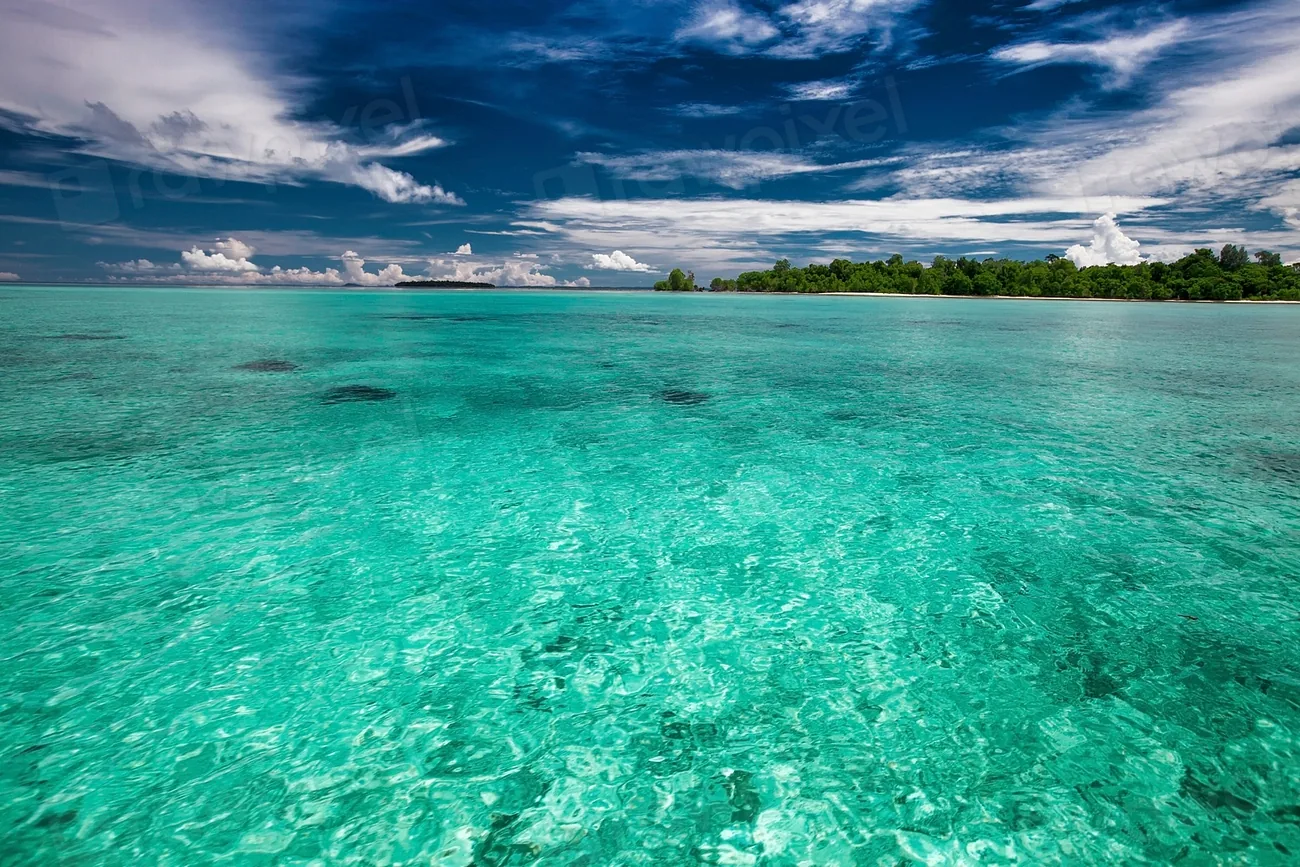 Clear turquoise shallows over sand